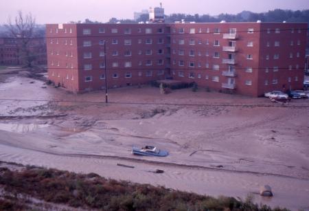Four Mile Run apartments with road under water, 1963.