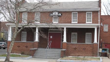 Brick building with porch and Elks sign