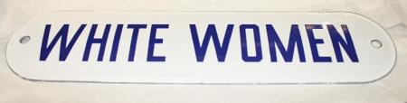 White women sign, with blue letters on white.