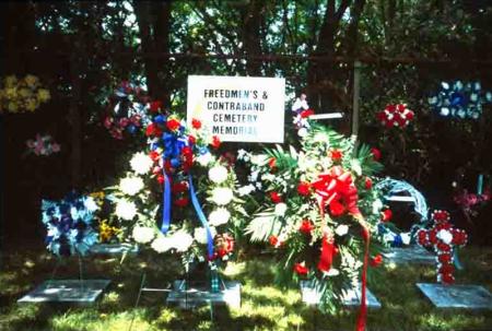 wreaths and sign Freedmen's and Contrabands Cemetery Memorial