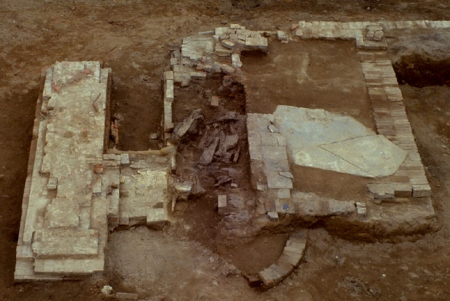 Excavated brick foundation of Building 3, which held the bakery's steam engine. Part of the circular well is visible as well.