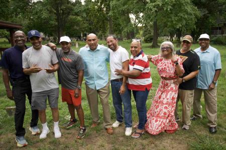 Descendants of Douglass Cemetery stand on the site where their ancestors were buried.