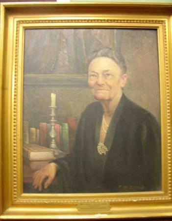 A mid-20th century painting of Rebecca Ramsay Reese shows an older woman with grey hair and a black outfit posed in front of a table with books and a candlestick.