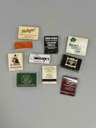Matchbooks advertise Alexandria restaurants Bilbo Baggins, Calvert Grill, Ireland’s Own, Le Refuge, Le Gaulois, Temp, Gadsby’s Tavern, Belle Haven Country Club, Savio’s, and Eastport Raw Bar.