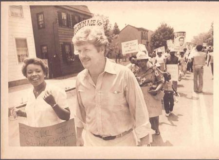 Patricia Byrd and Jim Moran lead the SCLC march.