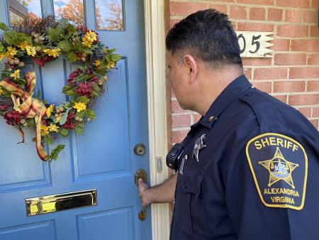 ASO Sheriff's Deputy Checks the Front Door of a Residence