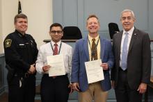 Sheriff Casey and Court Clerk Gregg Parks Stand with Two New Deputies at the Swearing In Ceremony