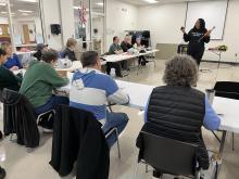 residents sitting on a classroom for the workshop