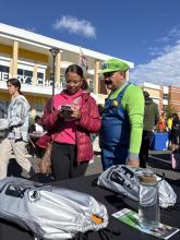 people in costumes applying for the program 
